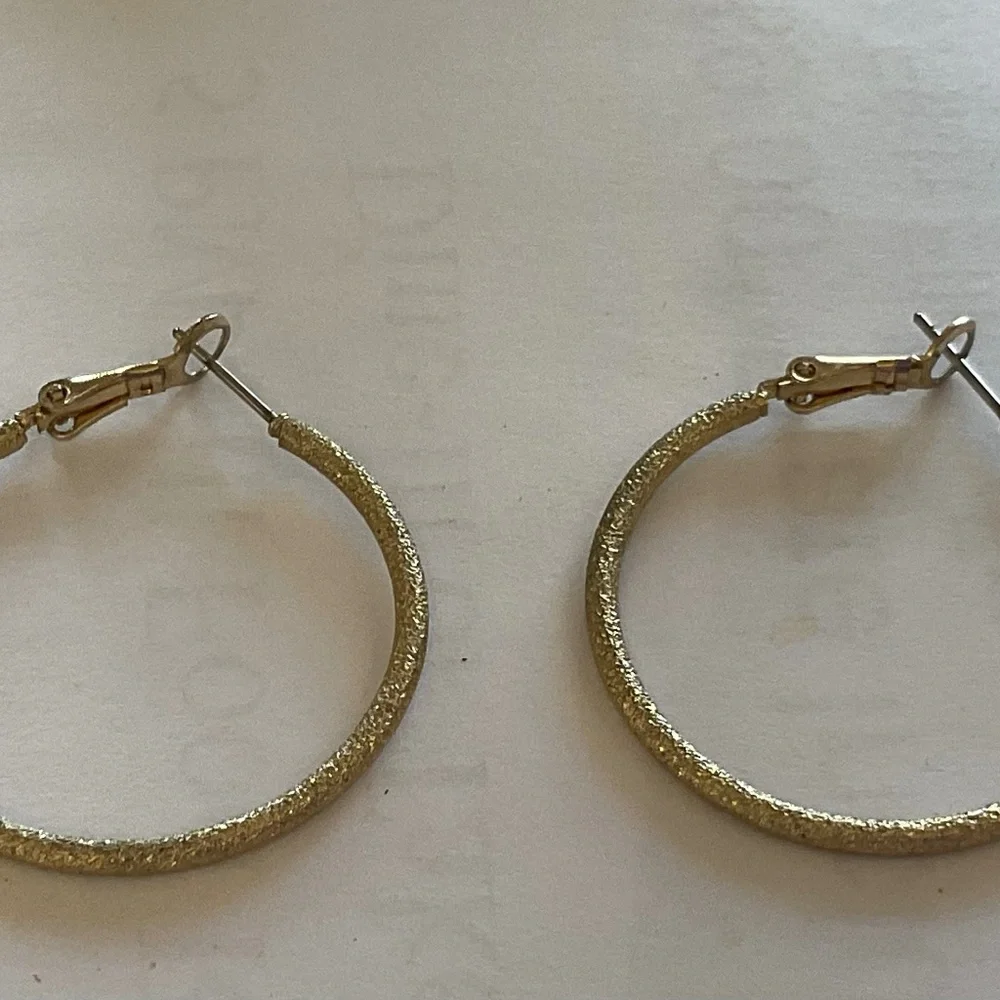 None hoop earrings